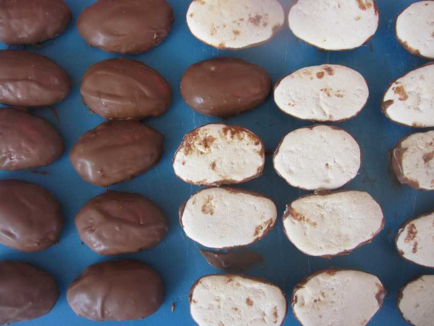 marshmallow half eggs coated in milk chocolate.  The flat surface is uncoated.
