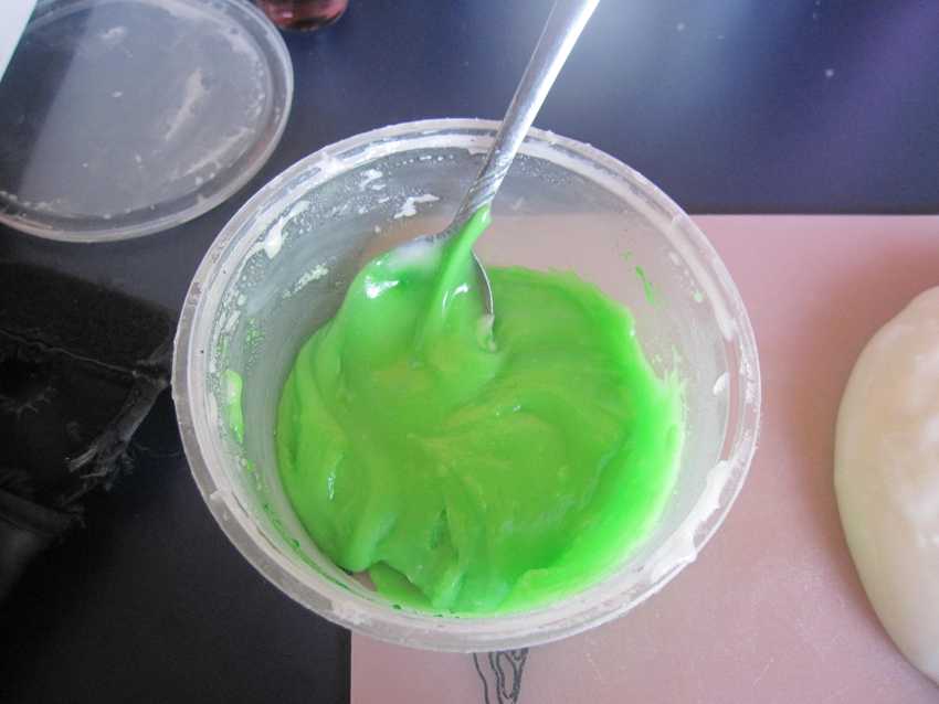 plastic bowl of lurid green paste