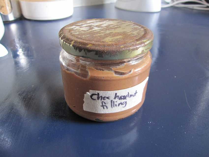 glass jar with brown contents labelled hazelnut filling