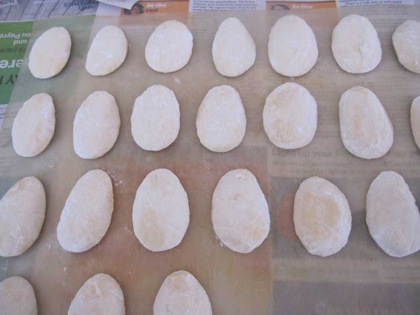 tray of half-eggs with flour dusted off