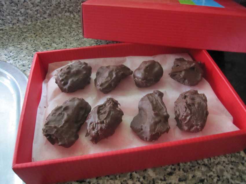 box of 8 lumpy things coated in dark chocolate