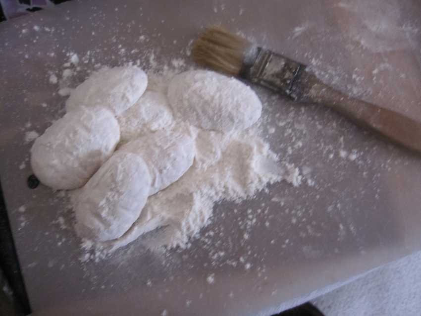 half-eggs of marshmallow covered in flour