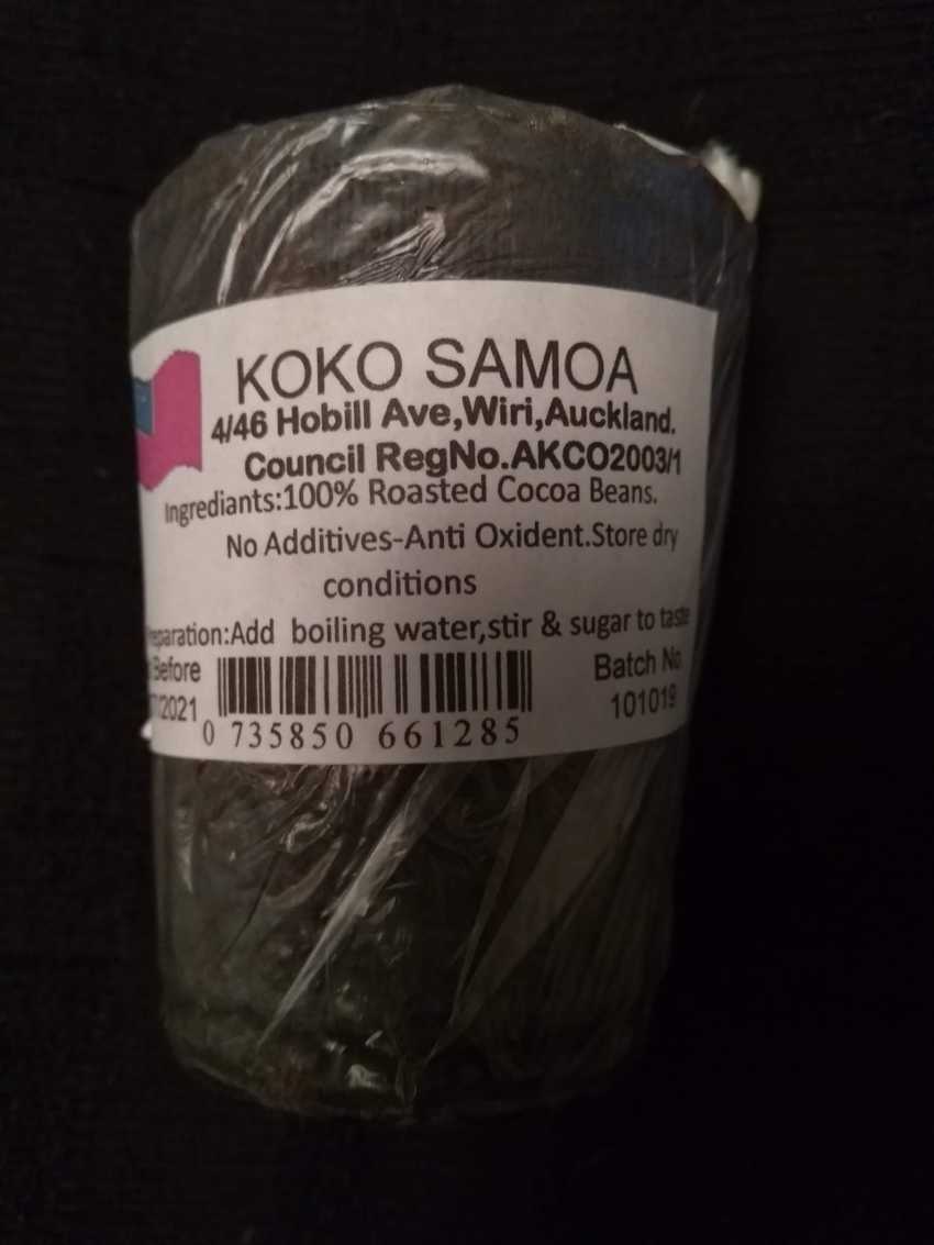 dark conical block of Koko Samoa with white nutritional information label