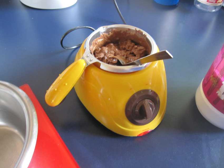 molten chocolate in heated bowl which is still lumpy